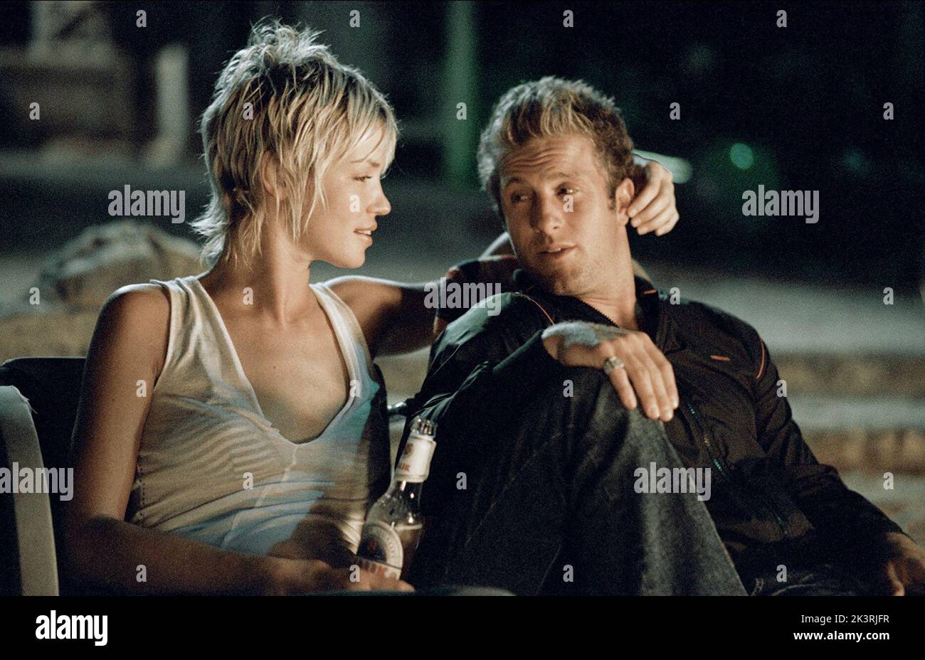 Ashley Scott & Scott Caan Film: Into The Blue (USA 2005) Characters: Amanda & Bryce  Director: John Stockwell 30 September 2005   **WARNING** This Photograph is for editorial use only and is the copyright of MGM and/or the Photographer assigned by the Film or Production Company and can only be reproduced by publications in conjunction with the promotion of the above Film. A Mandatory Credit To MGM is required. The Photographer should also be credited when known. No commercial use can be granted without written authority from the Film Company. Stock Photo