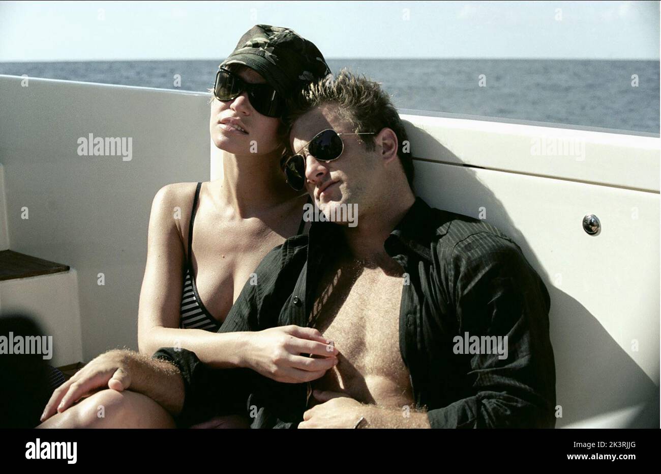Ashley Scott & Scott Caan Film: Into The Blue (USA 2005) Characters: Amanda & Bryce  Director: John Stockwell 30 September 2005   **WARNING** This Photograph is for editorial use only and is the copyright of MGM and/or the Photographer assigned by the Film or Production Company and can only be reproduced by publications in conjunction with the promotion of the above Film. A Mandatory Credit To MGM is required. The Photographer should also be credited when known. No commercial use can be granted without written authority from the Film Company. Stock Photo