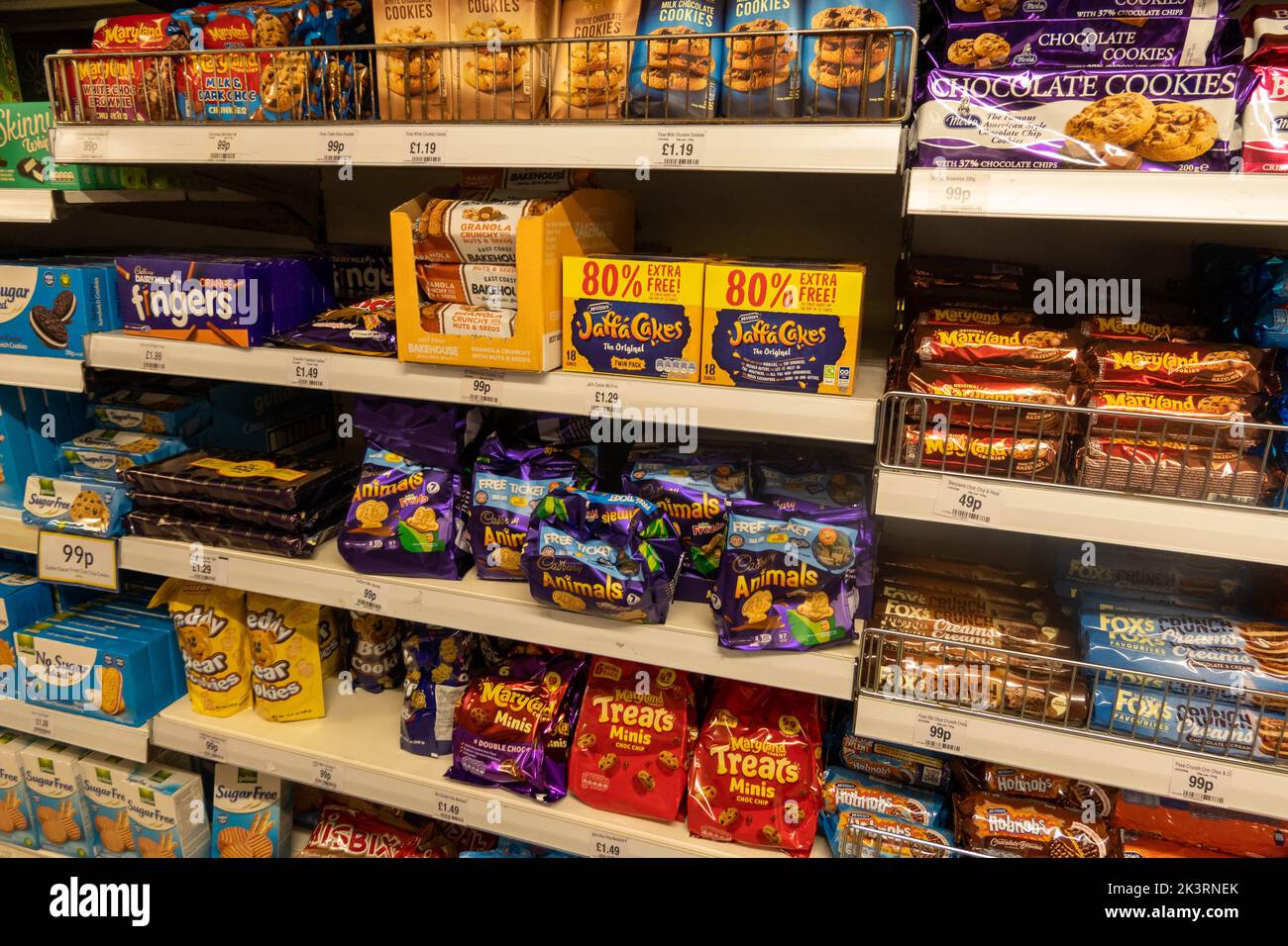 Biscuits on shelves in a British supermarket Stock Photo Alamy