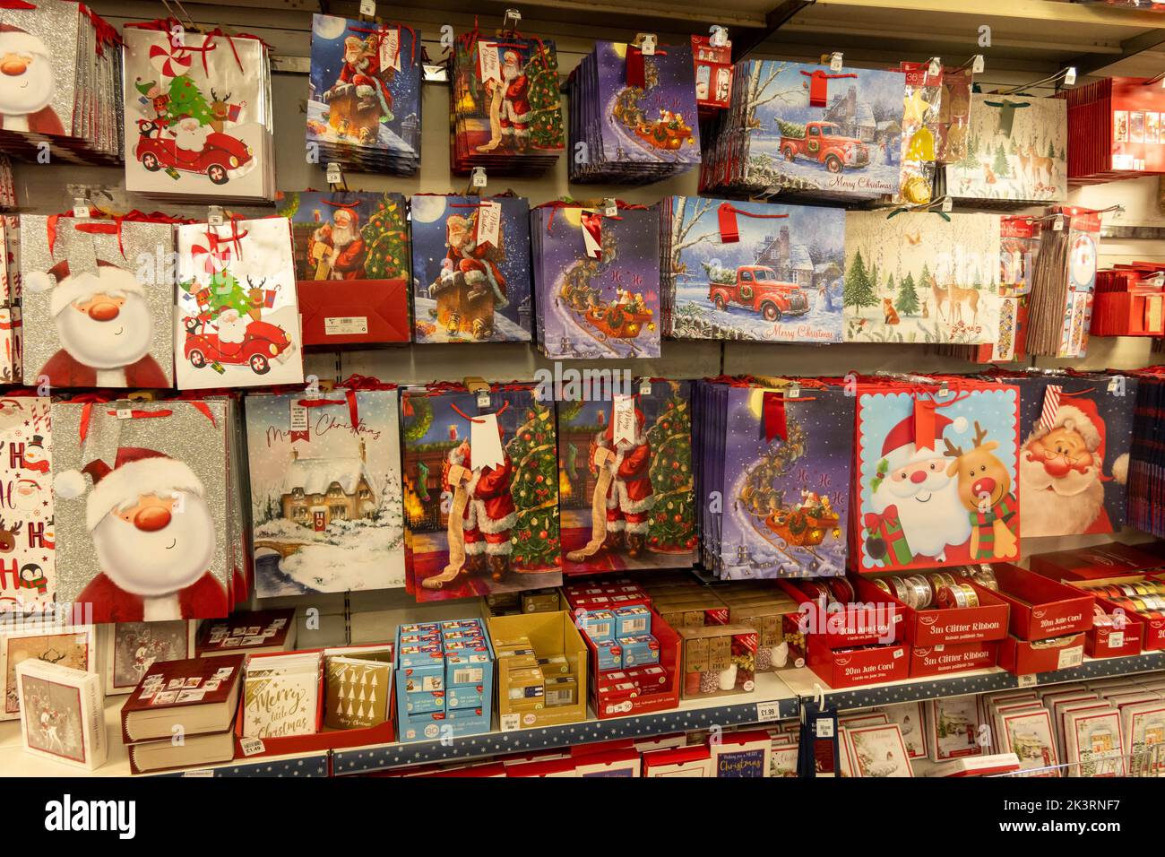 A view of Christmas cards and Christmas bags for sale at a supermarket in Norfolk Stock Photo