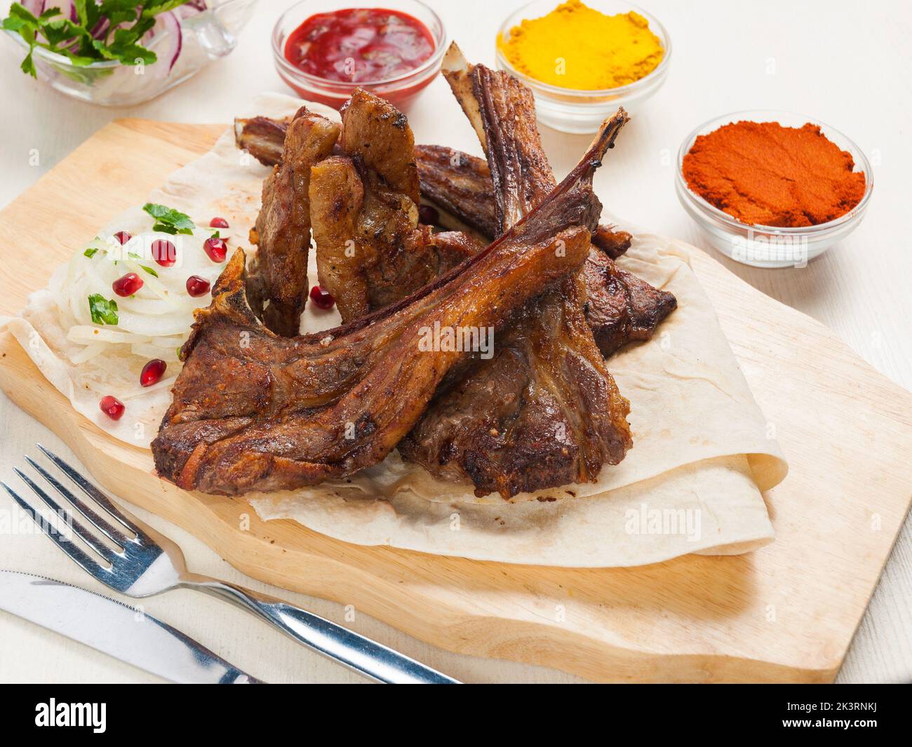 tasty lamb loin on pita bread with onion and pomegranate seeds Stock Photo Alamy