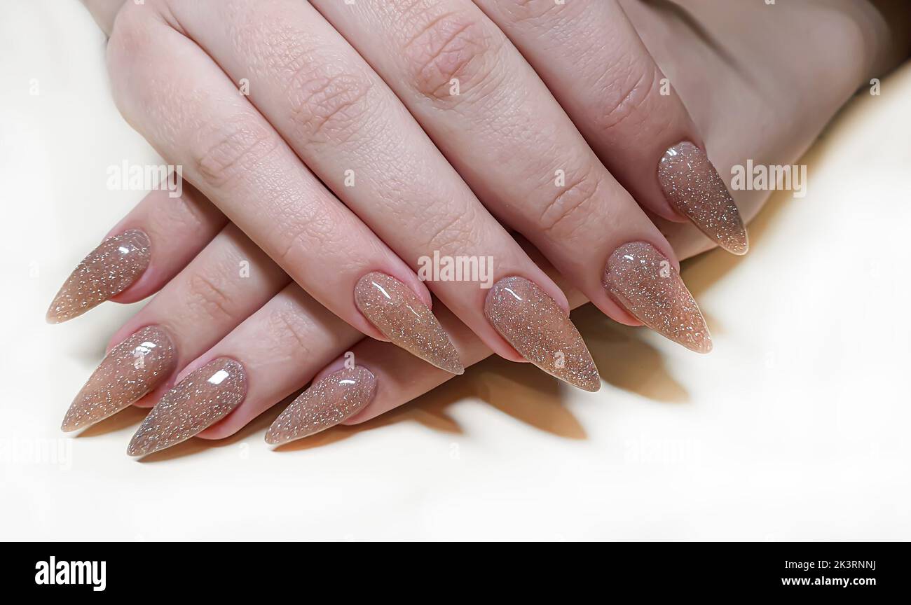 Manicure and nail extension with acrylic and gel. The design is made with reflective gel polishes. Beauty and fashion Stock Photo - Alamy Manicure and nail extension with acrylic and gel. The design is made with reflective gel polishes. Beauty and fashion Stock Photo - Alamy