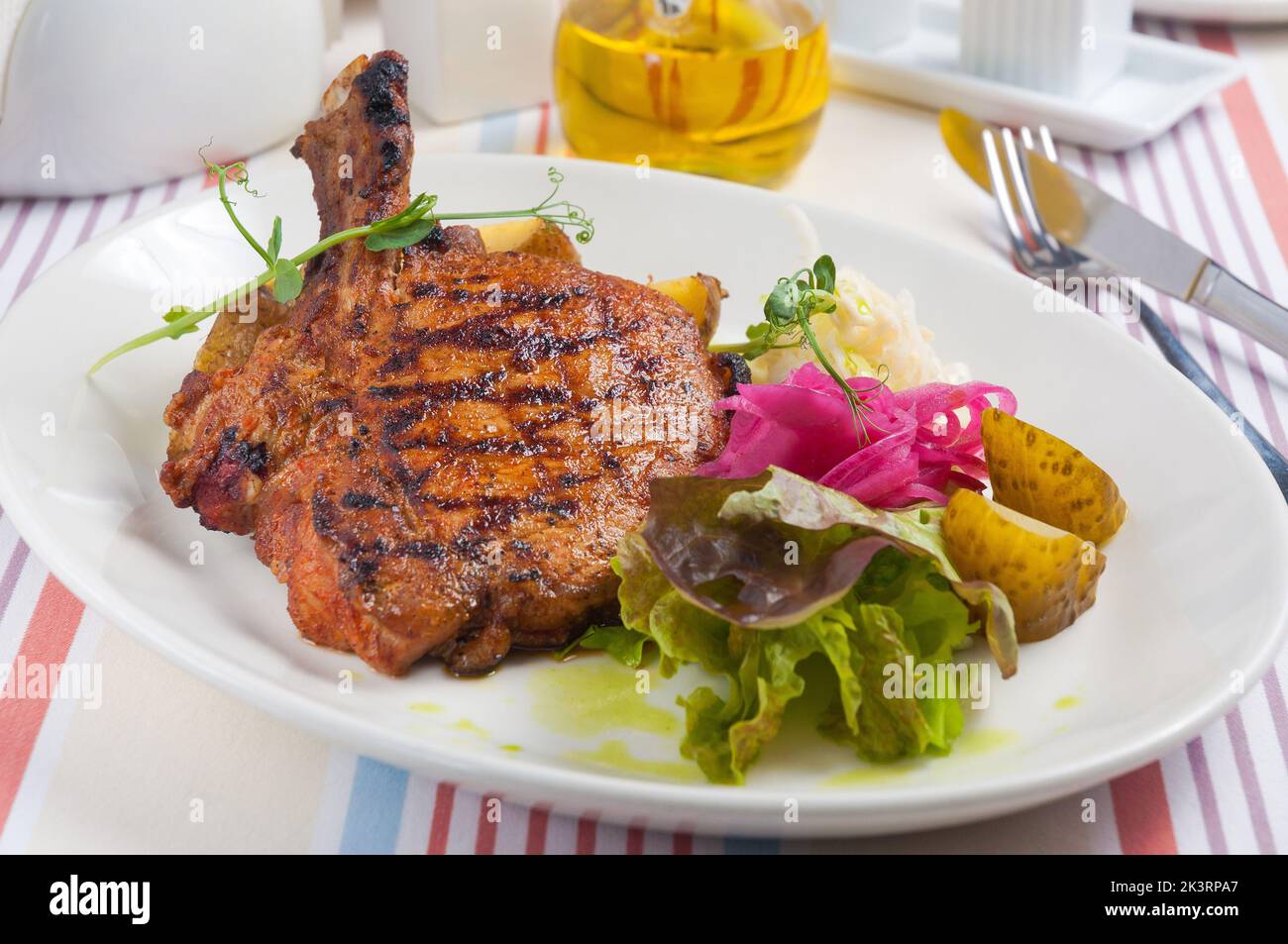 tasty pork loin on coals with potatoes and cabbage Stock Photo Alamy