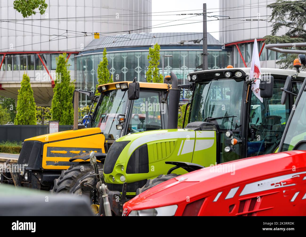 Strasbourg, France - April 30, 2021: Three tractors in front of European Court of Human Rights Stock Photo