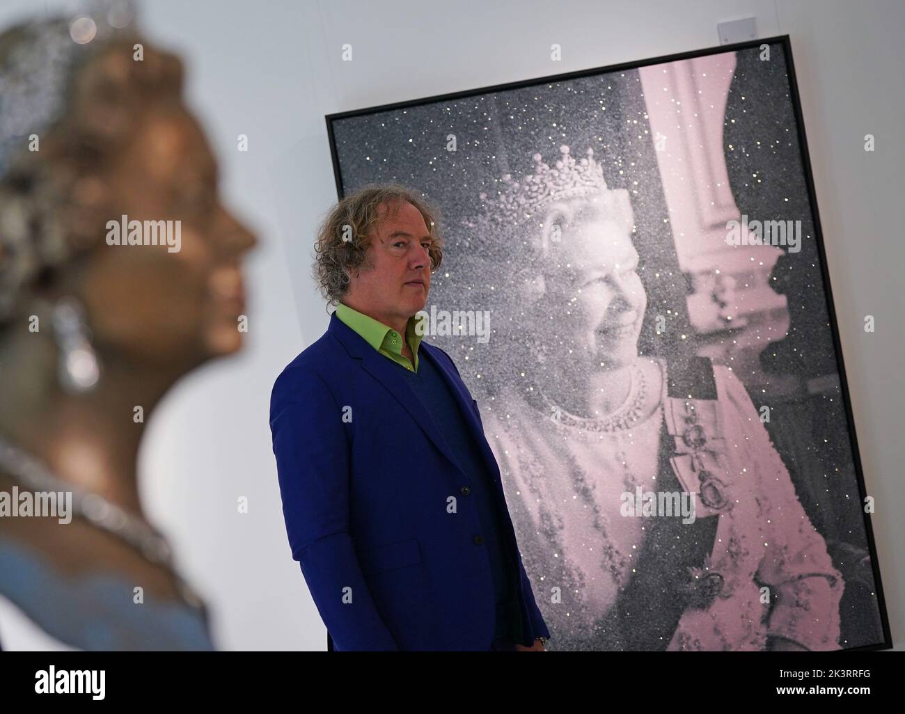 Artist Christian Furr poses next to his work (right) Diamond Dust Queen ...