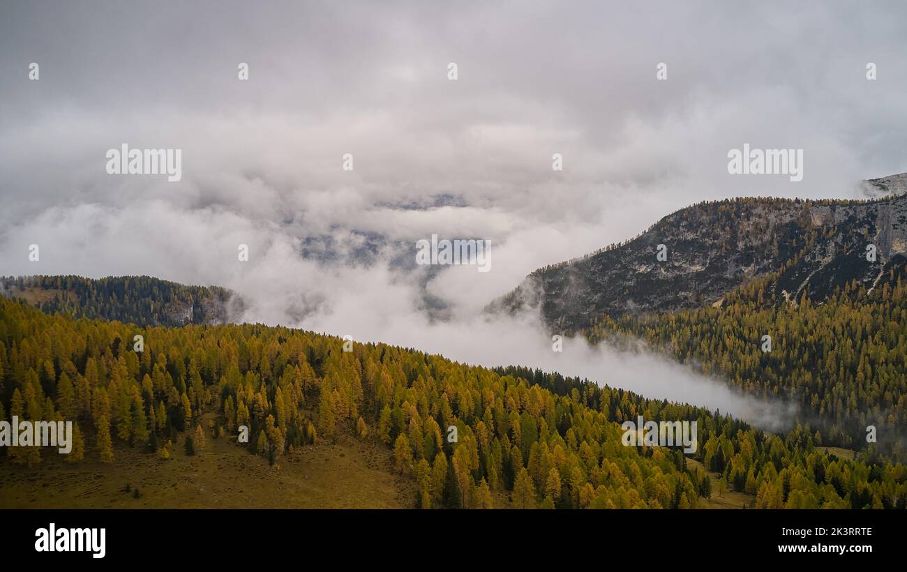 Dolomite mountain peaks in the fog hi-res stock photography and images ...