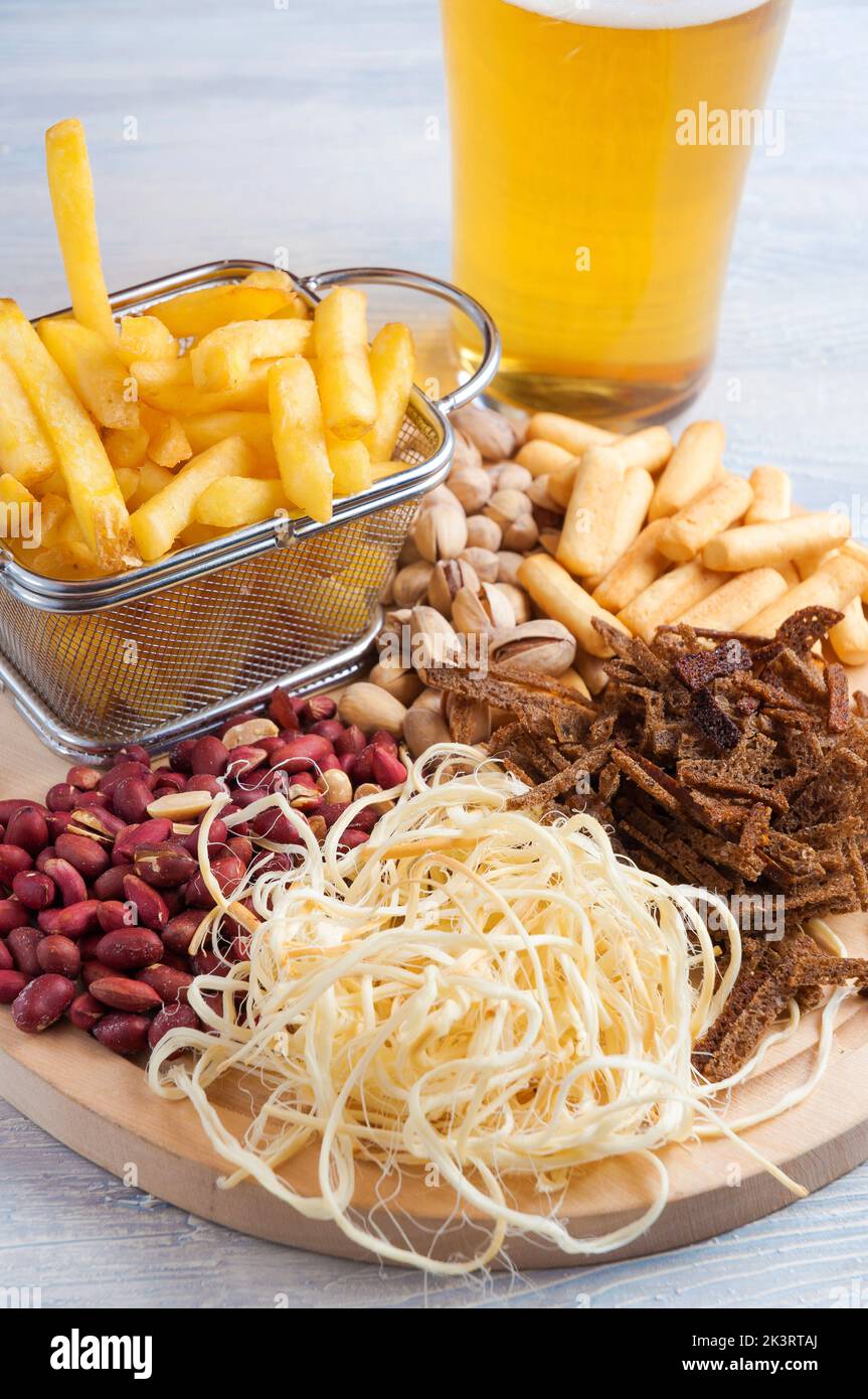 tasty beer snacks peanuts, pistachios, croutons cheese French fries