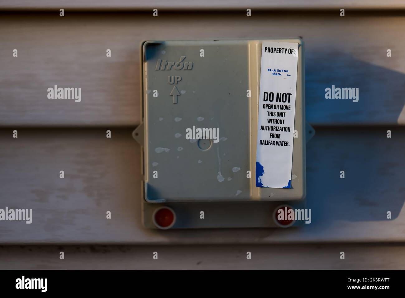 Electric energy meter inside a residential building in Halifax. A smart electric power meter