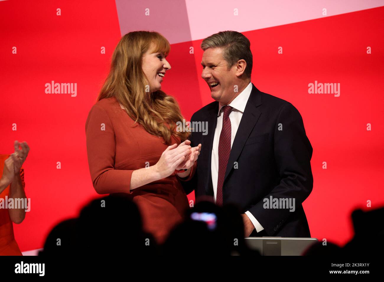 British Labour Party leader Keir Starmer and deputy leader of the Labour Party Angela Rayner react on stage, at Britain's Labour Party annual conference in Liverpool, Britain, September 28, 2022. REUTERS/Phil Noble Stock Photo