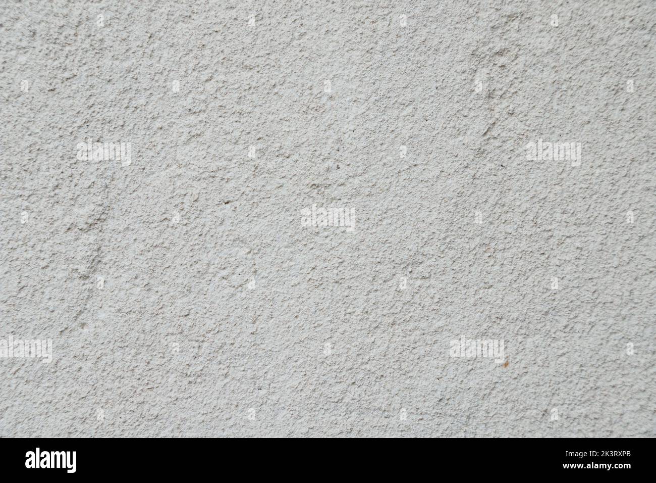 Texture of beige decorative plaster. Construction and finishing
