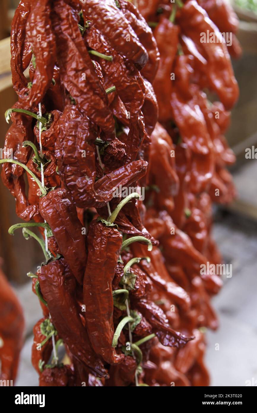 Dried red peppers in agriculture market, vegetables Stock Photo