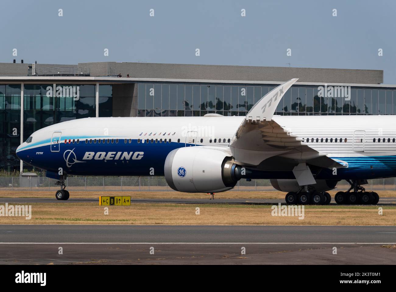 Boeing 777-9, also known as 777X, airliner jet plane taxiing at Farnborough International Airshow 2022. General Electric GE9X engine nacelle Stock Photo