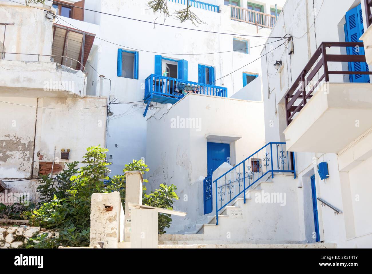 Cyclades Naxos island, Greece. Whitewashed buildings, balconies and stairs. Traditional architecture in white and blue colors. Summer holiday destinat Stock Photo