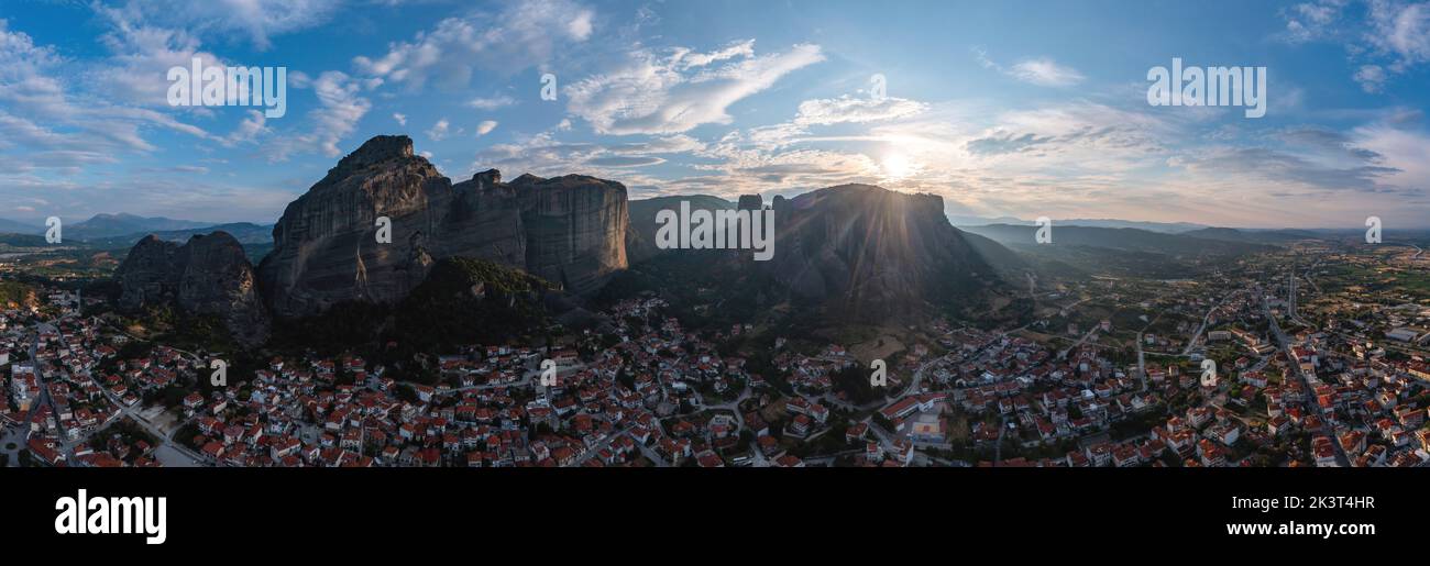 Meteora Greece panorama. Sunset and cloudy sky over Kalabaka town. Rock formations landscape, Europe travel destination Stock Photo