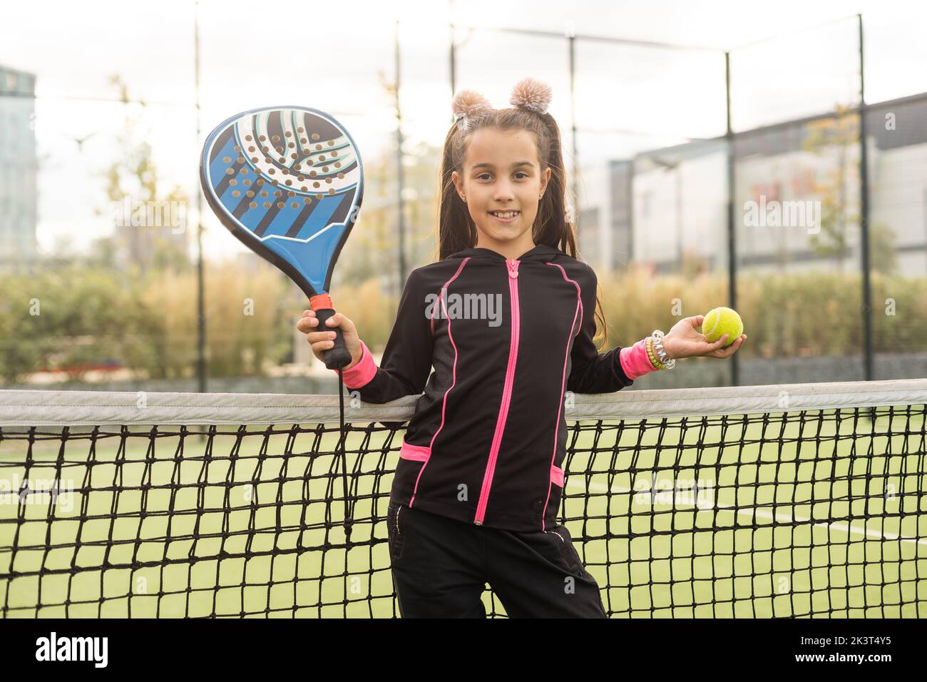 little Girl playing paddle tennis Stock Photo Alamy