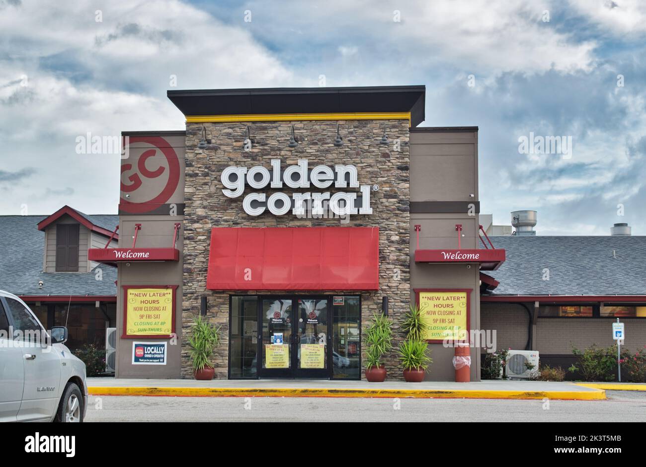 Houston, Texas USA 12-03-2021: Golden Corral buffet exterior and parking lot in Houston, TX. All you can eat American restaurant chain. Stock Photo