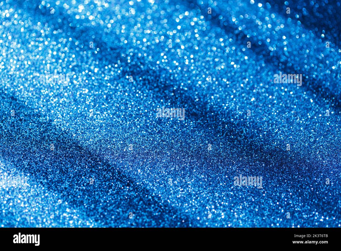 Blue glitter texture holidays background. Macro shot Stock Photo