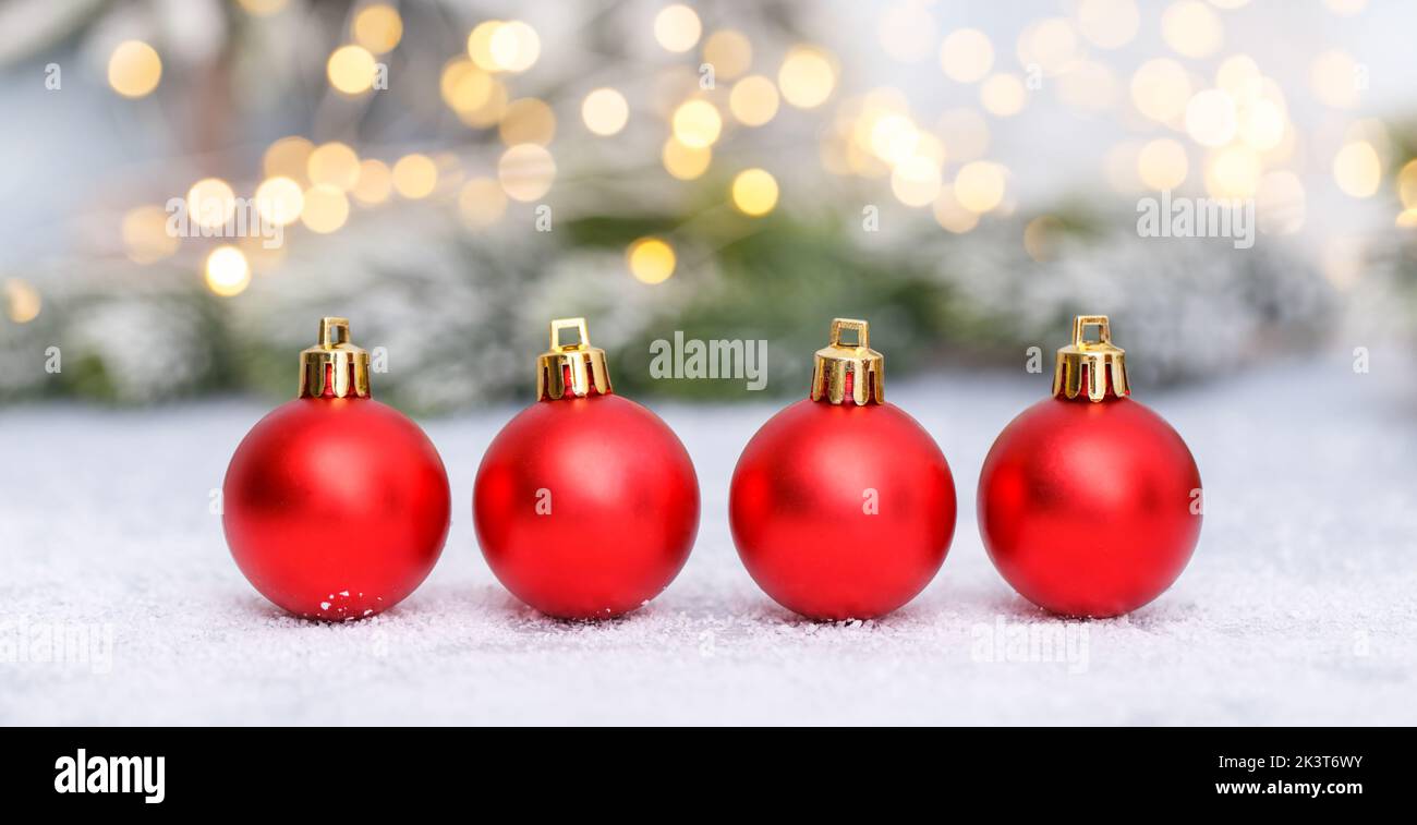 Christmas decorations red balls on the snow holiday card template banner Stock Photo