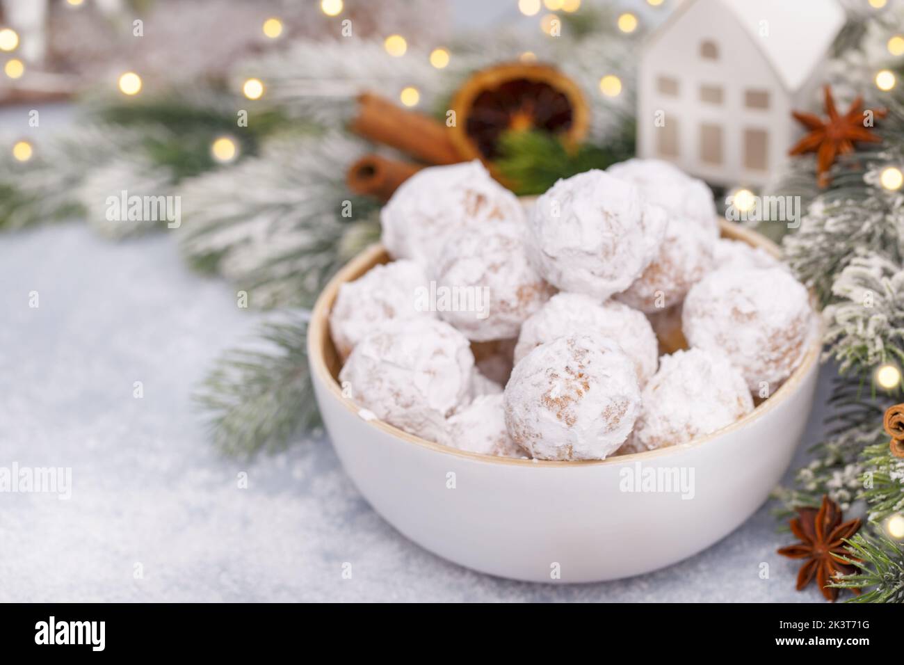 Traditional Christmas cookies with almonds on the snowy background Stock Photo
