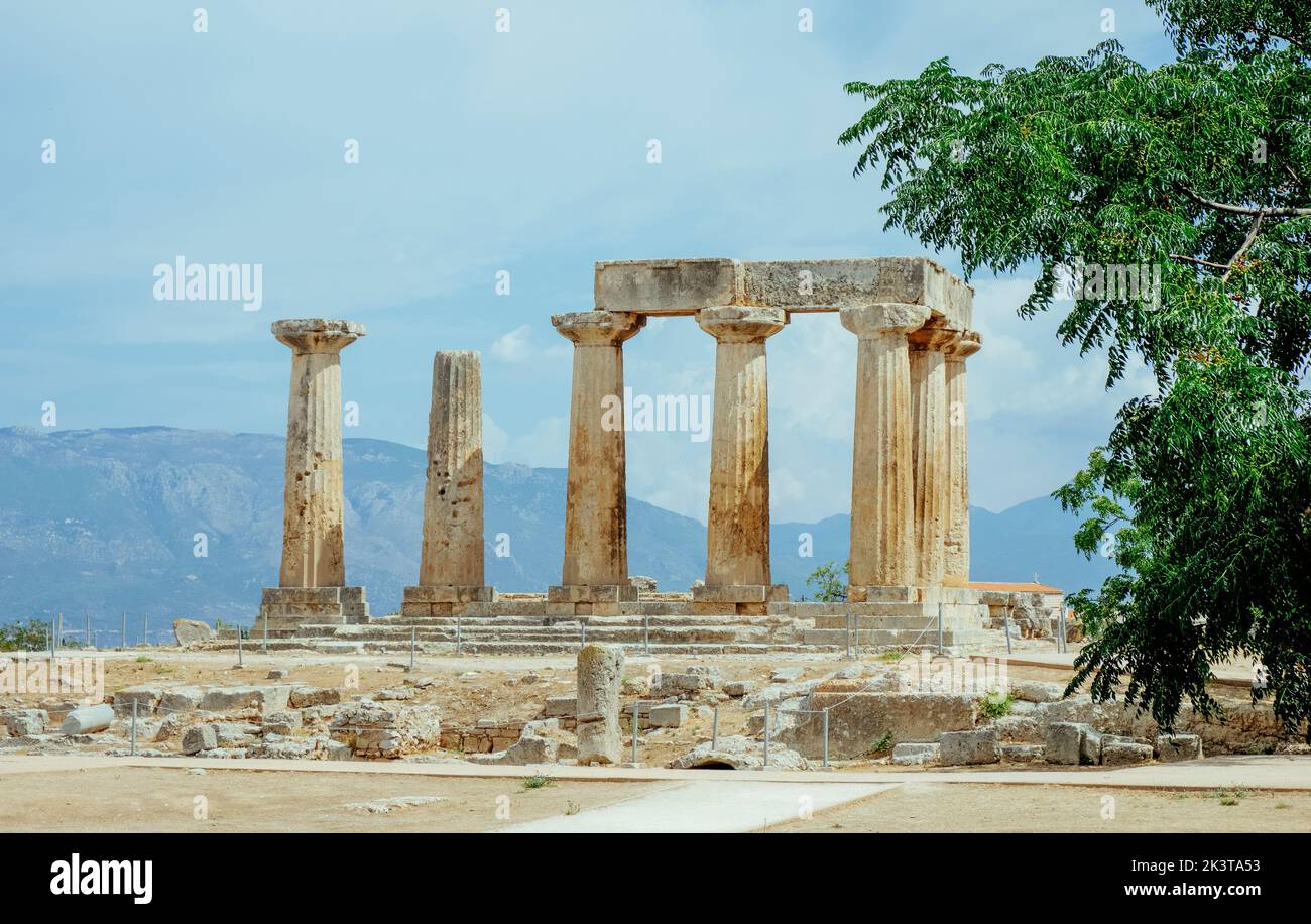 the remains of the famous Temple of Apollo, in the Ancient Corinth, Greece, on a summer day Stock Photo