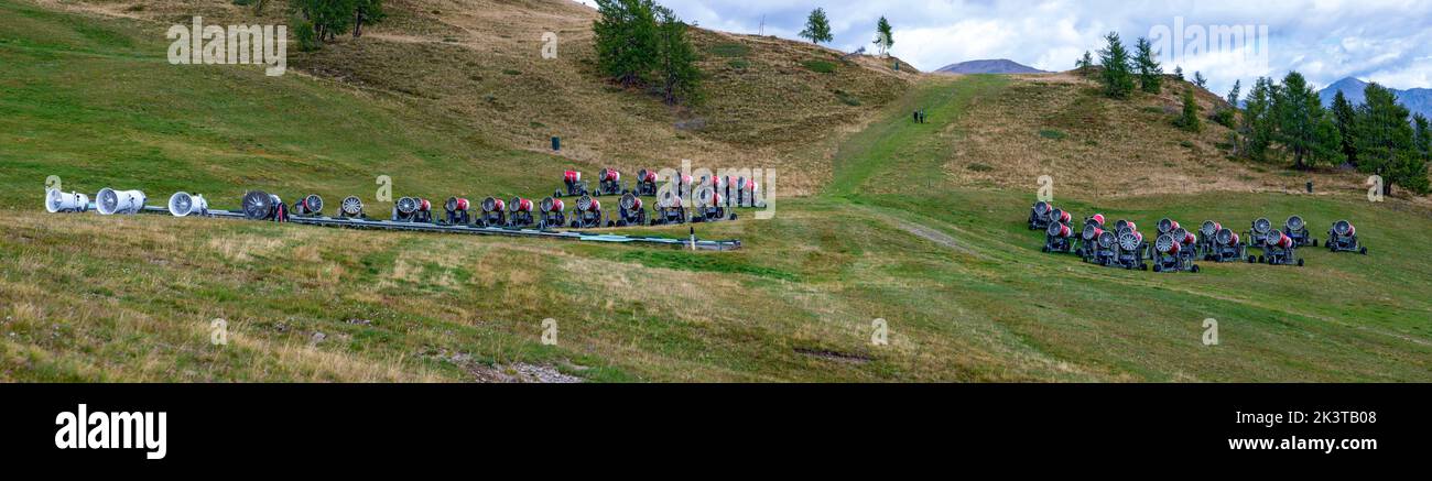 some rows of snow making machines on an alp in autumn in the region Hochpustertal in Eastern Tirol, Austria Stock Photo