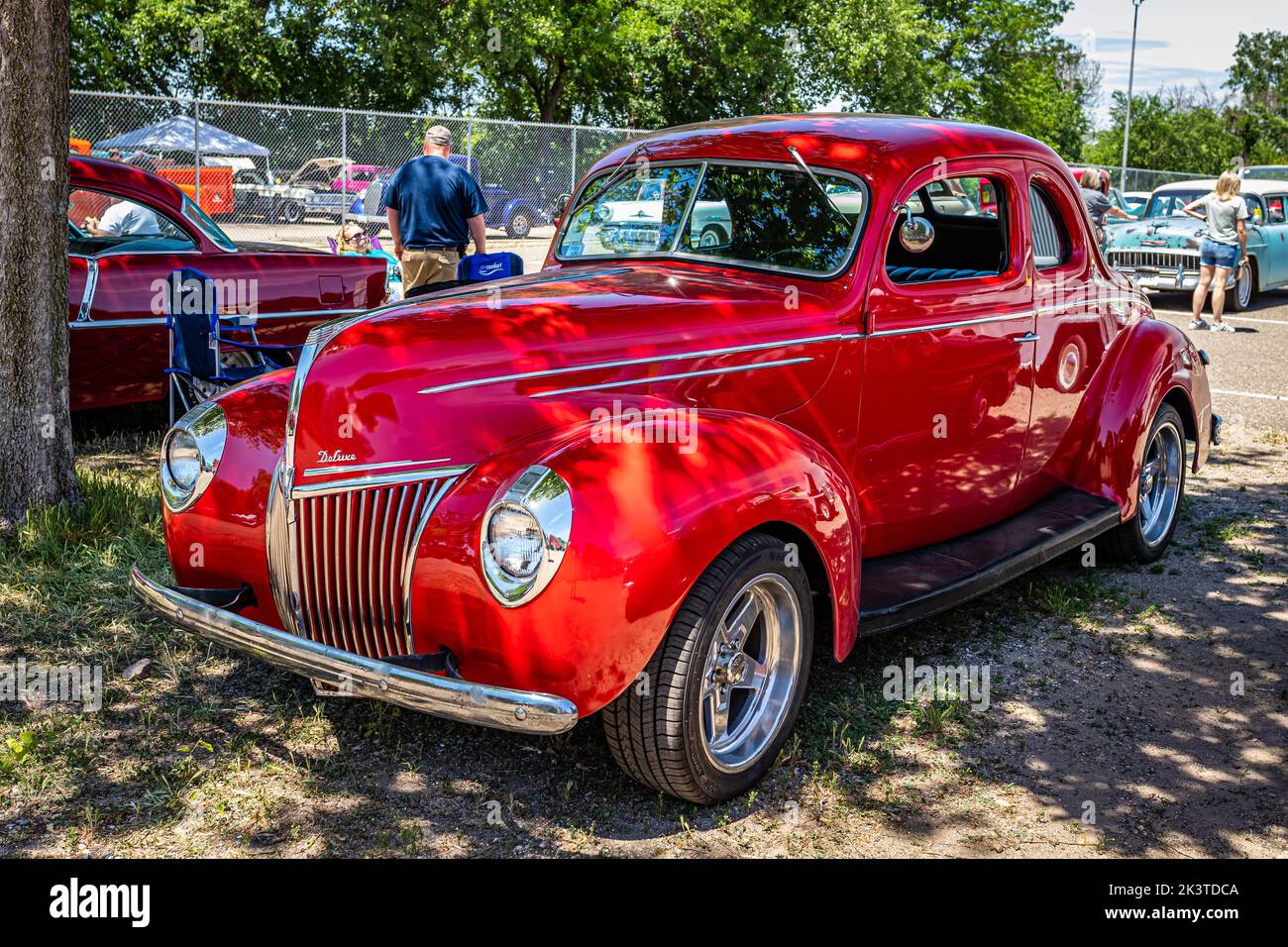 Falcon Heights, MN - June 18, 2022: High perspective front corner view of a 1939 Ford V8 Deluxe Coupe at a local car show. Stock Photo