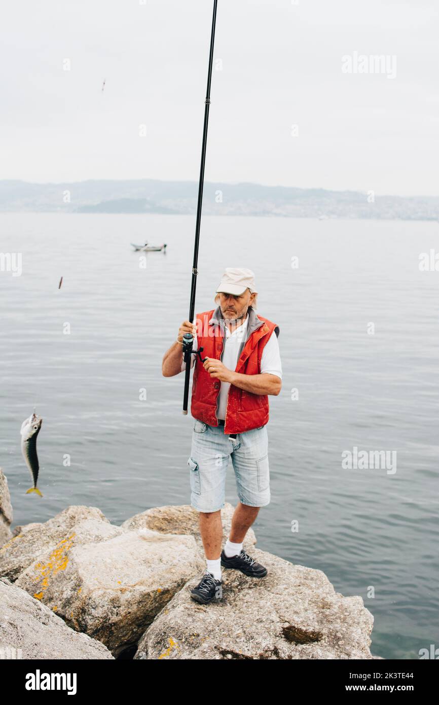 Angling man adult vertical hi-res stock photography and images - Page 2 -  Alamy