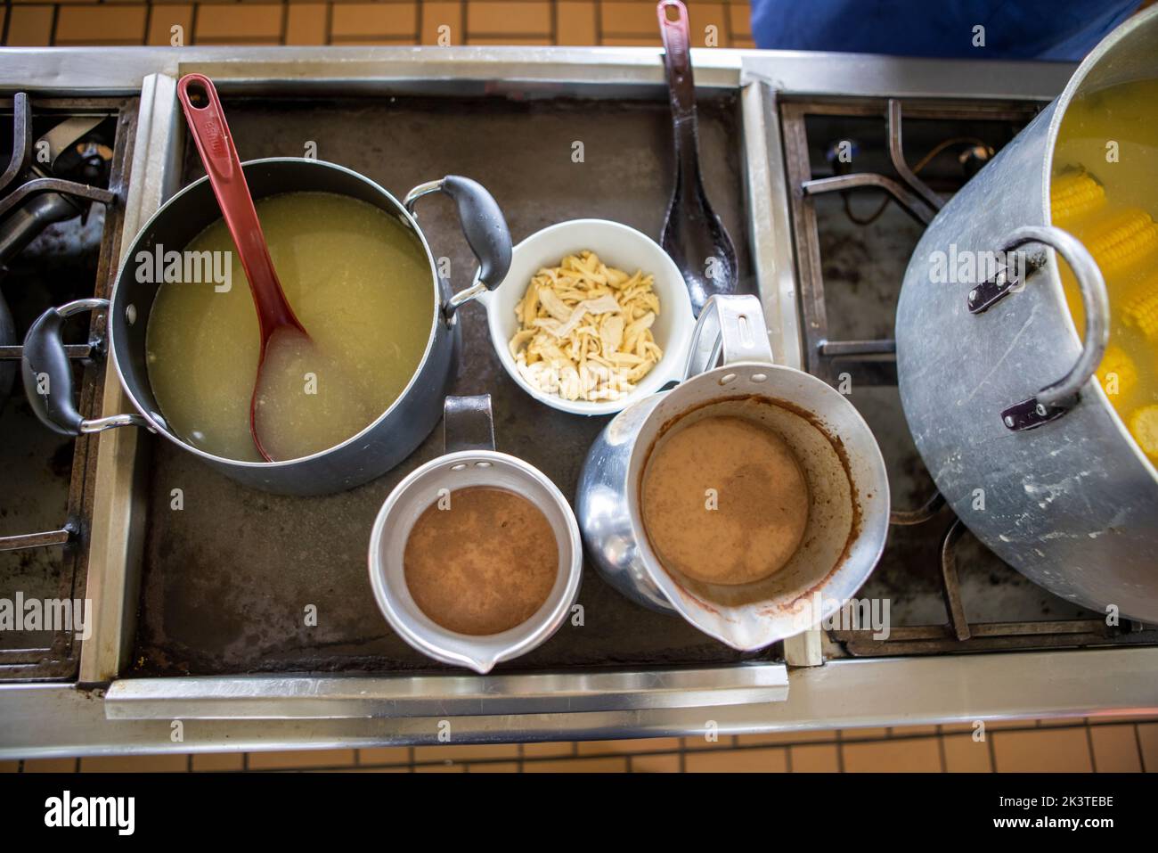 Jilted Example From above saucepans with delicious broth and jilted chicken placed on ...