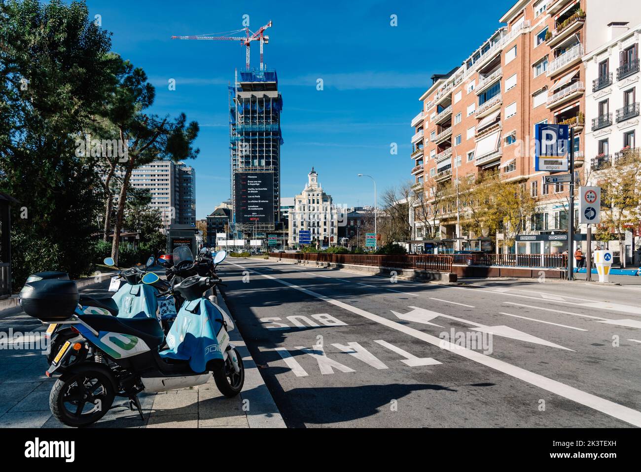 Madrid, Spain - December 12, 2021: Colon Square in central Madrid. View of Goya Street and Colon Towers under renovation Stock Photo