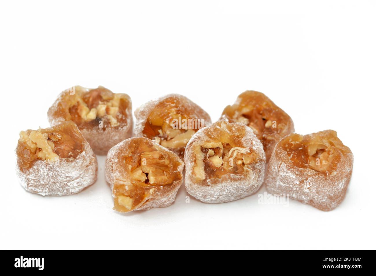Arabian Egyptian taffy stuffed with walnuts, Eastern candy made as a