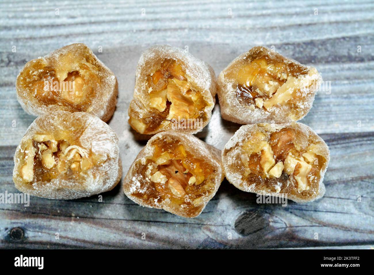 Arabian Egyptian taffy stuffed with walnuts, Eastern candy made as a
