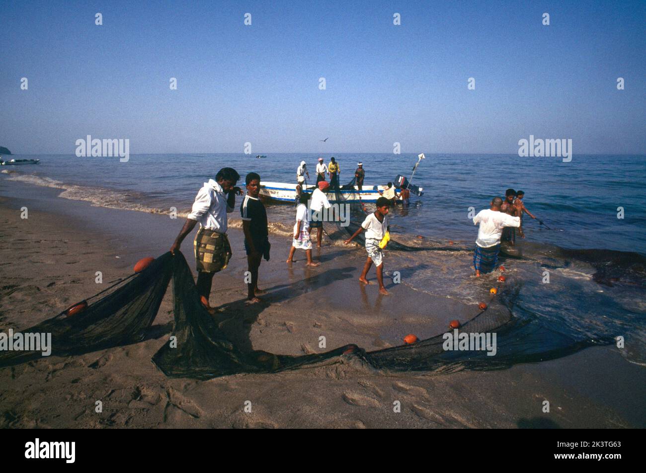 Sharjah UAE Fishermen Clearing Up Oil Spill Khor Fakkan Stock Photo