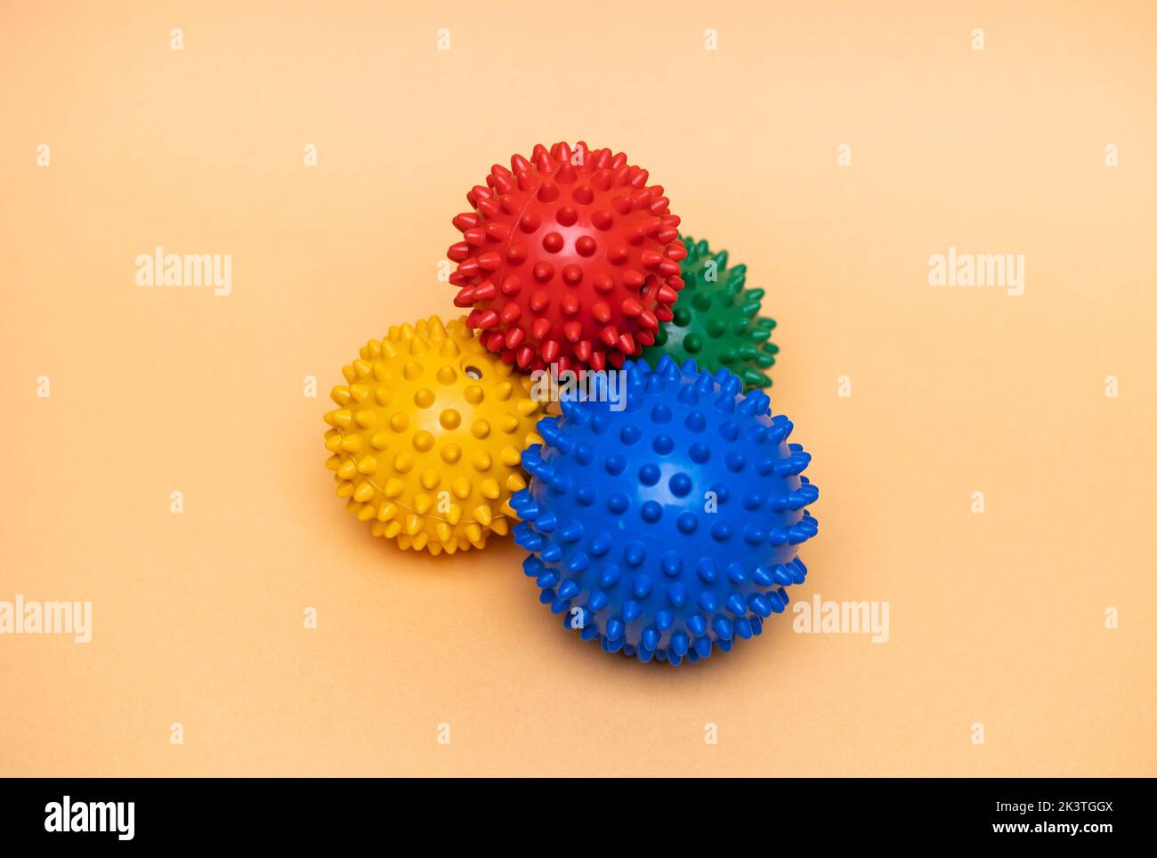 Four different sizes of dog chewing balls Stock Photo Alamy