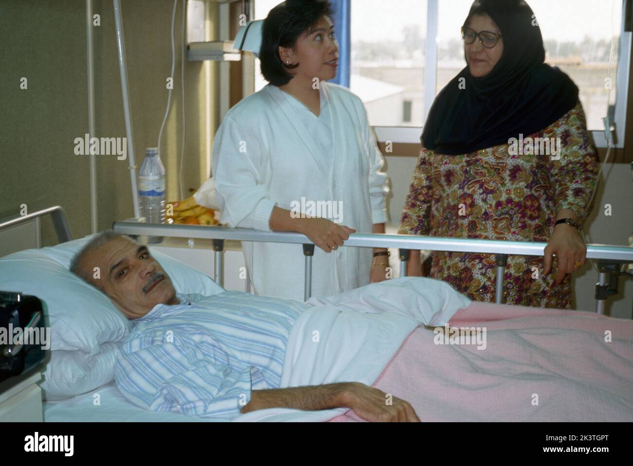 Kuwait Cancer Ward Kuwait Hospital Patient In Bed with Nurse Talking to