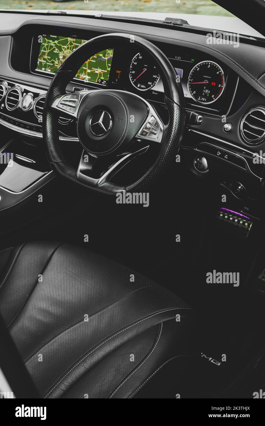 Mercedes Benz C-class interior, Luxury car inside focusing on the steering wheel and seating Stock Photo
