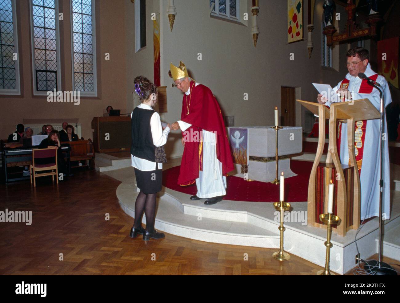 St Joseph's Church England Bishop Presenting Candidate a Certificate at Confirmation Stock Photo