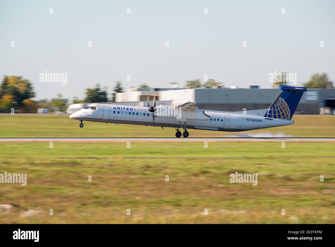 United Airlines propeller commercial aircraft landing at the Ottawa