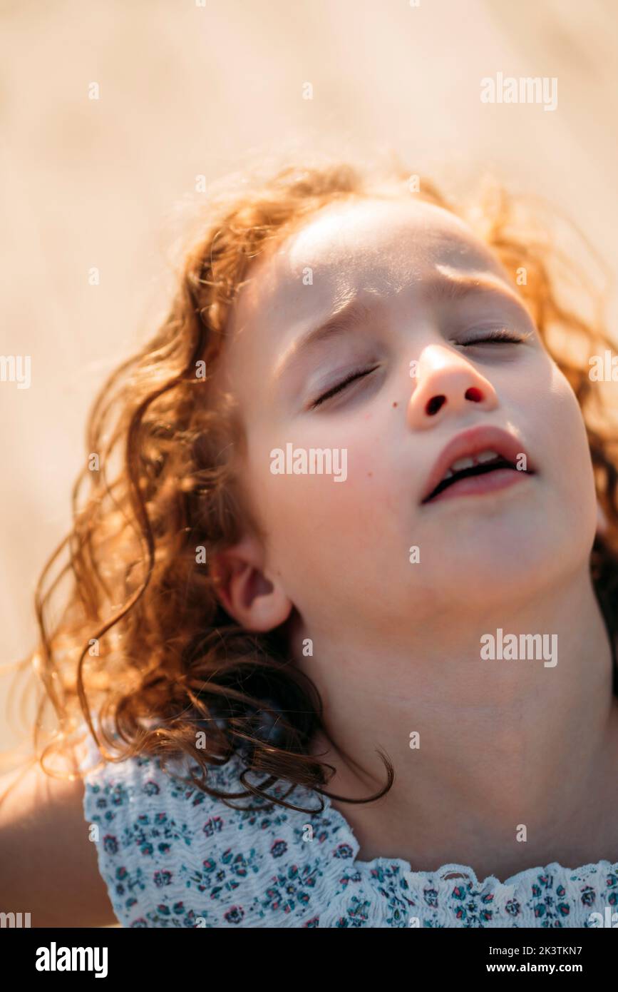 Girl with closed eyes Stock Photo - Alamy