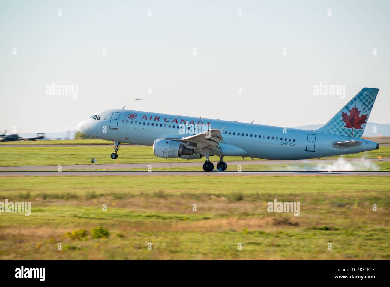 An Air Canada commercial jet aircraft landing at the Ottawa McDonald