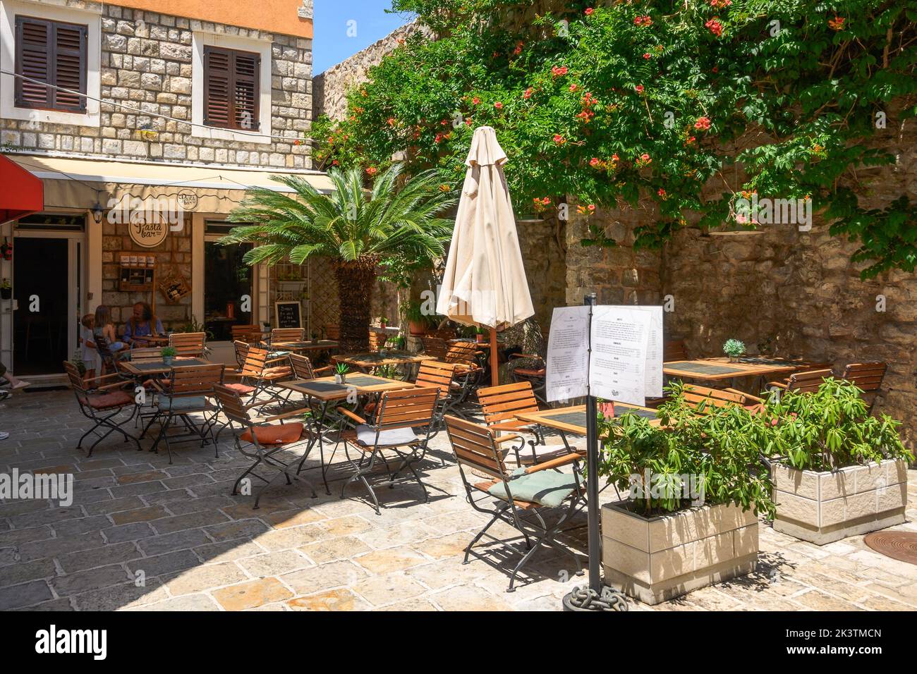 Budva, Montenegro - June 6, 2022: Restaurant in Budva Old Town. Budva city is a famous tourist destination in Montenegro Stock Photo