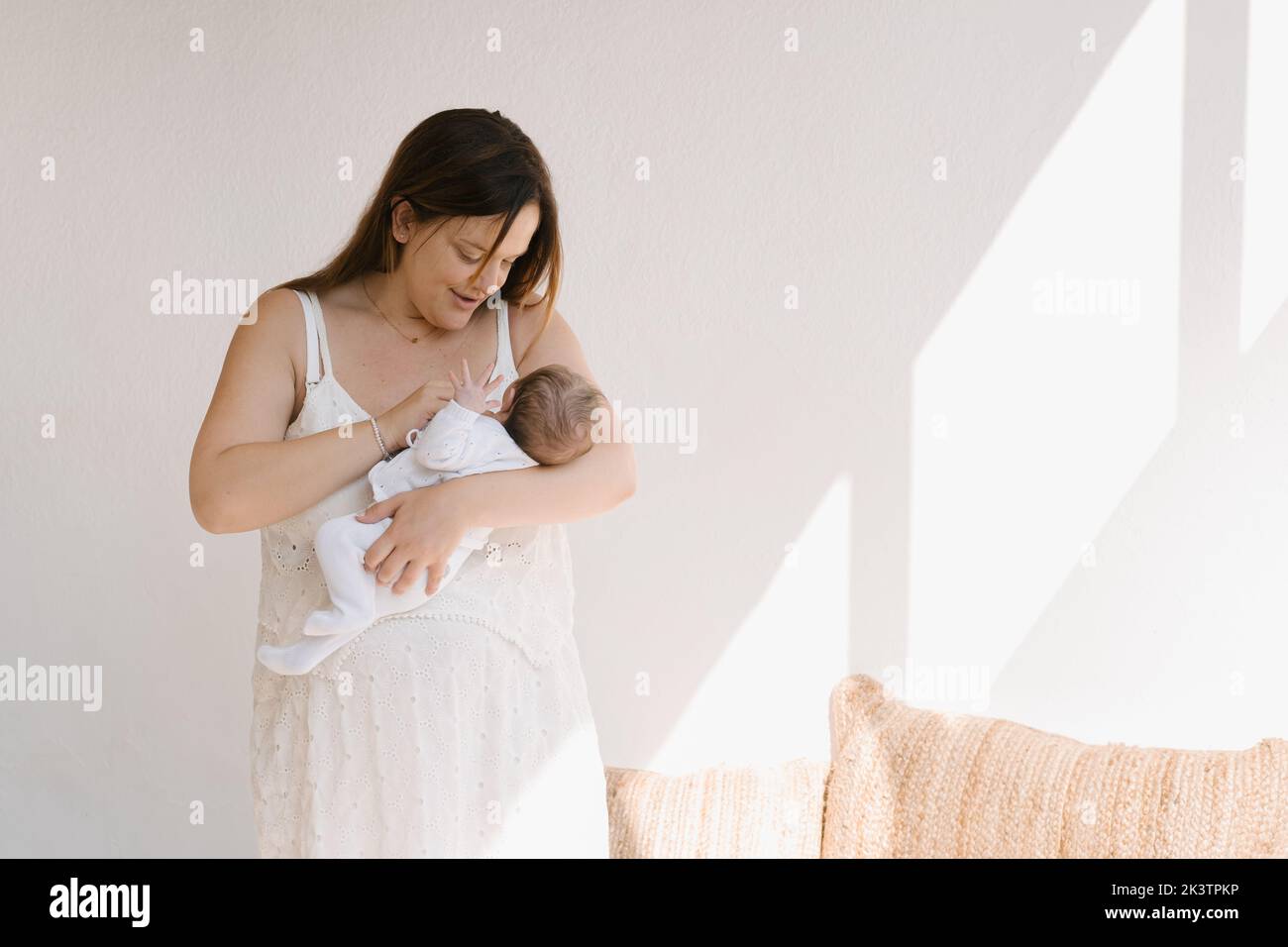 Baby sleeping on mom chest hi-res stock photography and images - Alamy