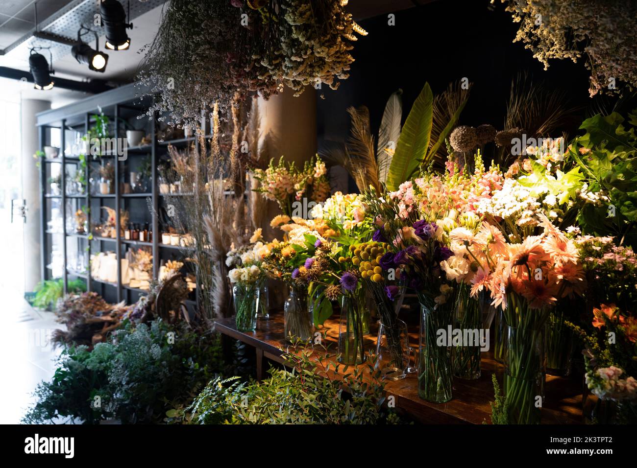 View of inside of interior design showroom with samples of various types of flower bouquets Stock Photo