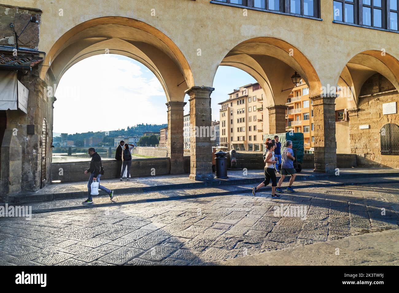 FLORENCE, ITALY - SEPTEMNER 18, 2018: This is a gap between the houses on the medieval Old Bridge (Ponte Vecchio) under the Vasari Corridor on an autu Stock Photo