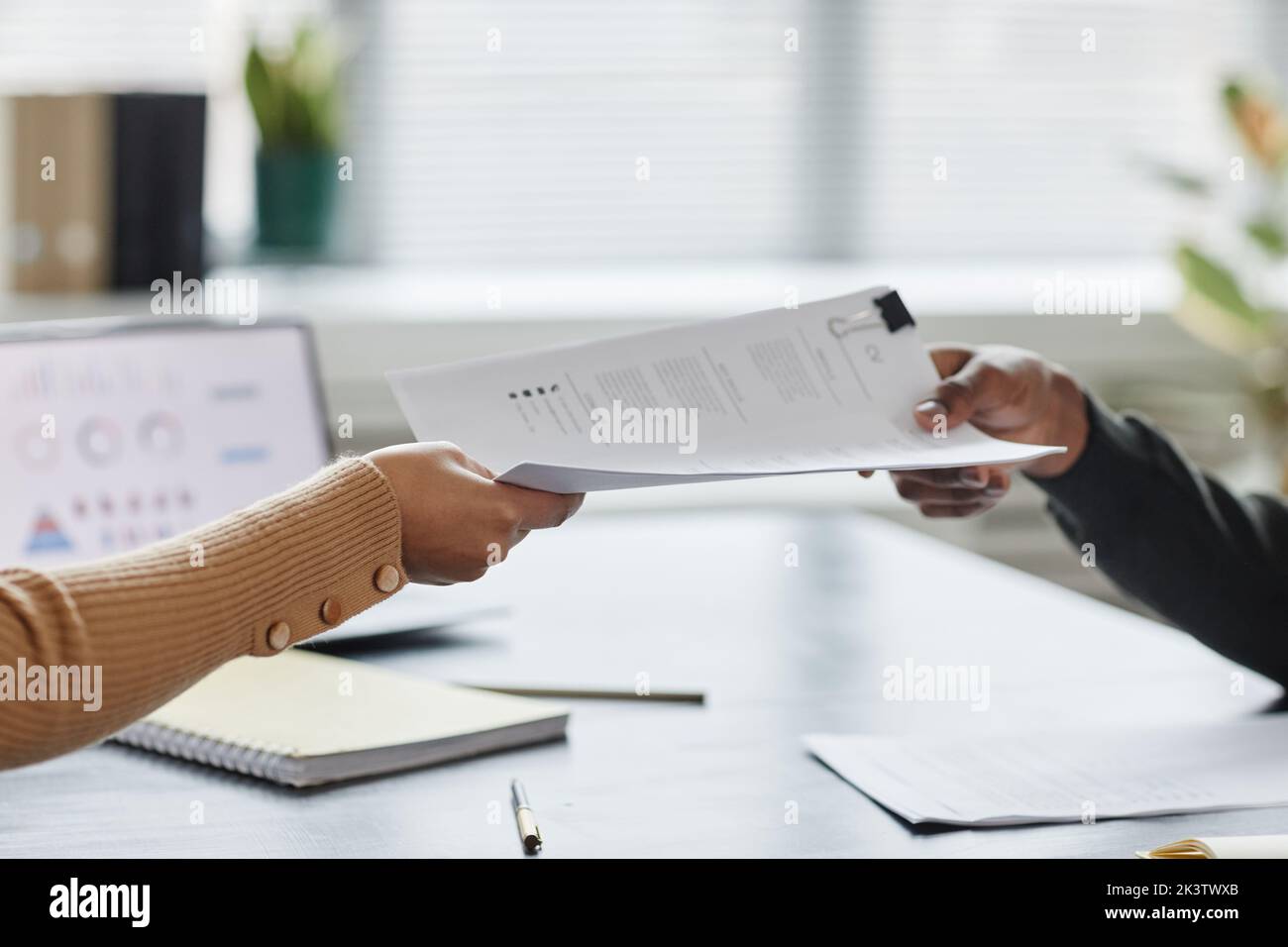 Businessman handing over contract hi-res stock photography and images ...