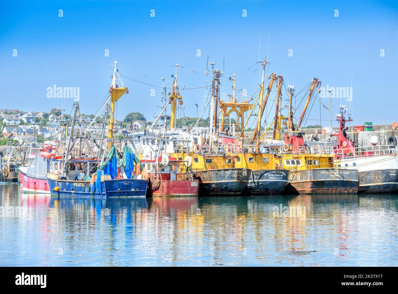 Trawlers awaiting repair in Newlyn harbour in Cornwall, UK Stock Photo