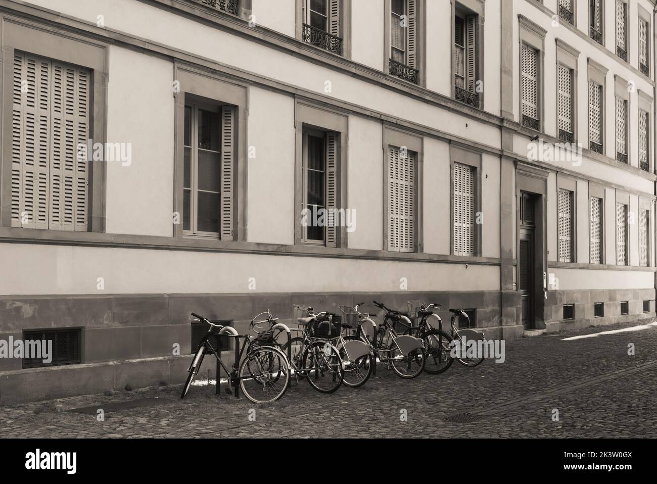 Bicycles parked on the street in Strasbourg France Stock Photo