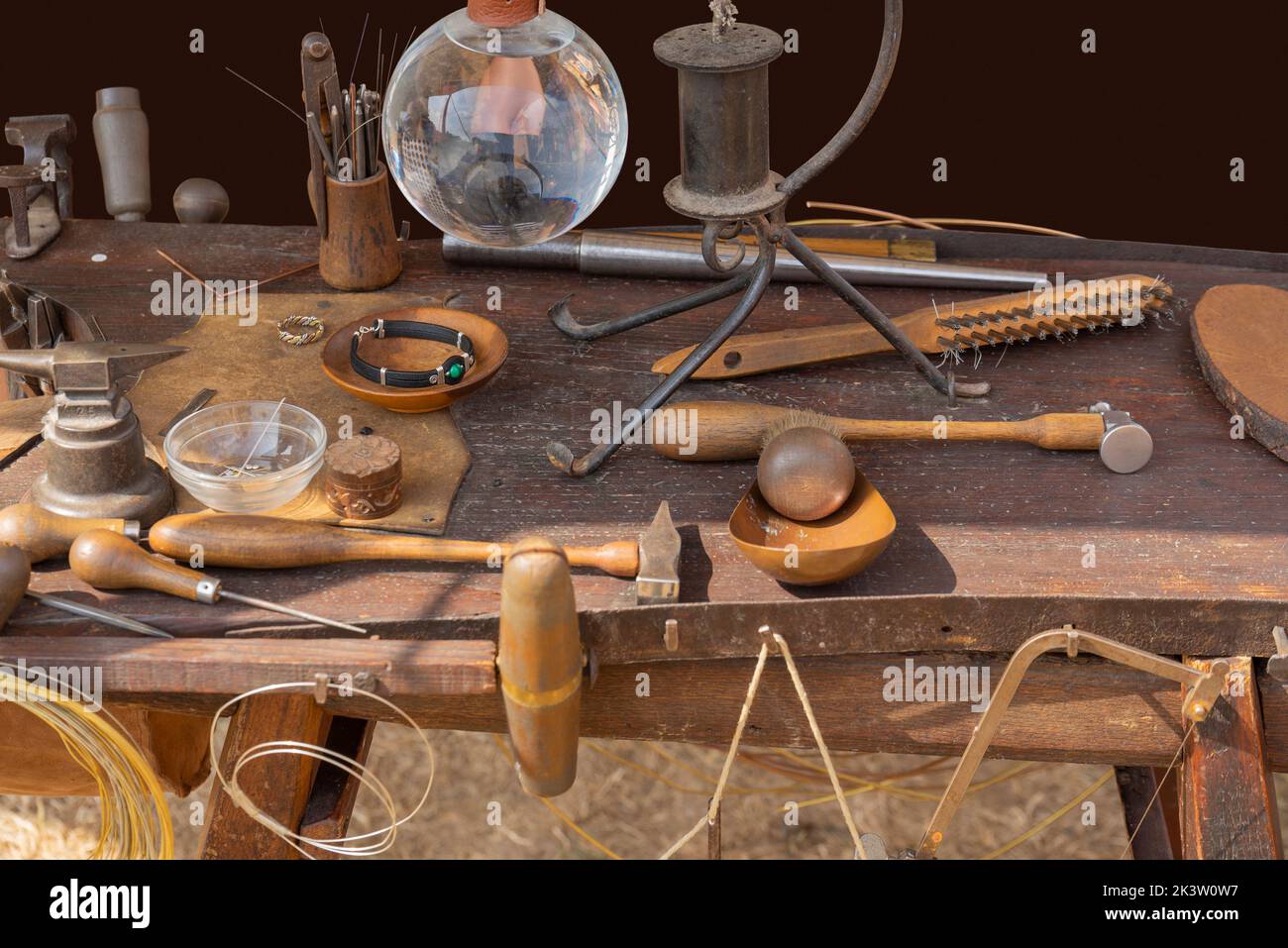 Lots of historic handcraft equipment on wooden table Stock Photo