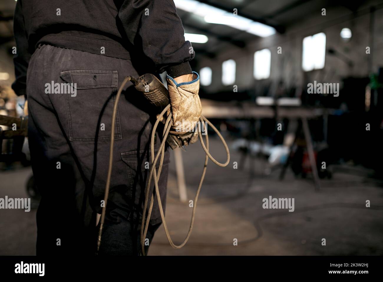 Male welder working hard in workshop Stock Photo