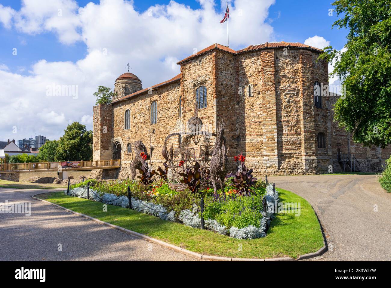 Flower beds in front of Colchester castle a Norman castle in Colchester Castle Park Colchester Essex England UK GB Europe Stock Photo