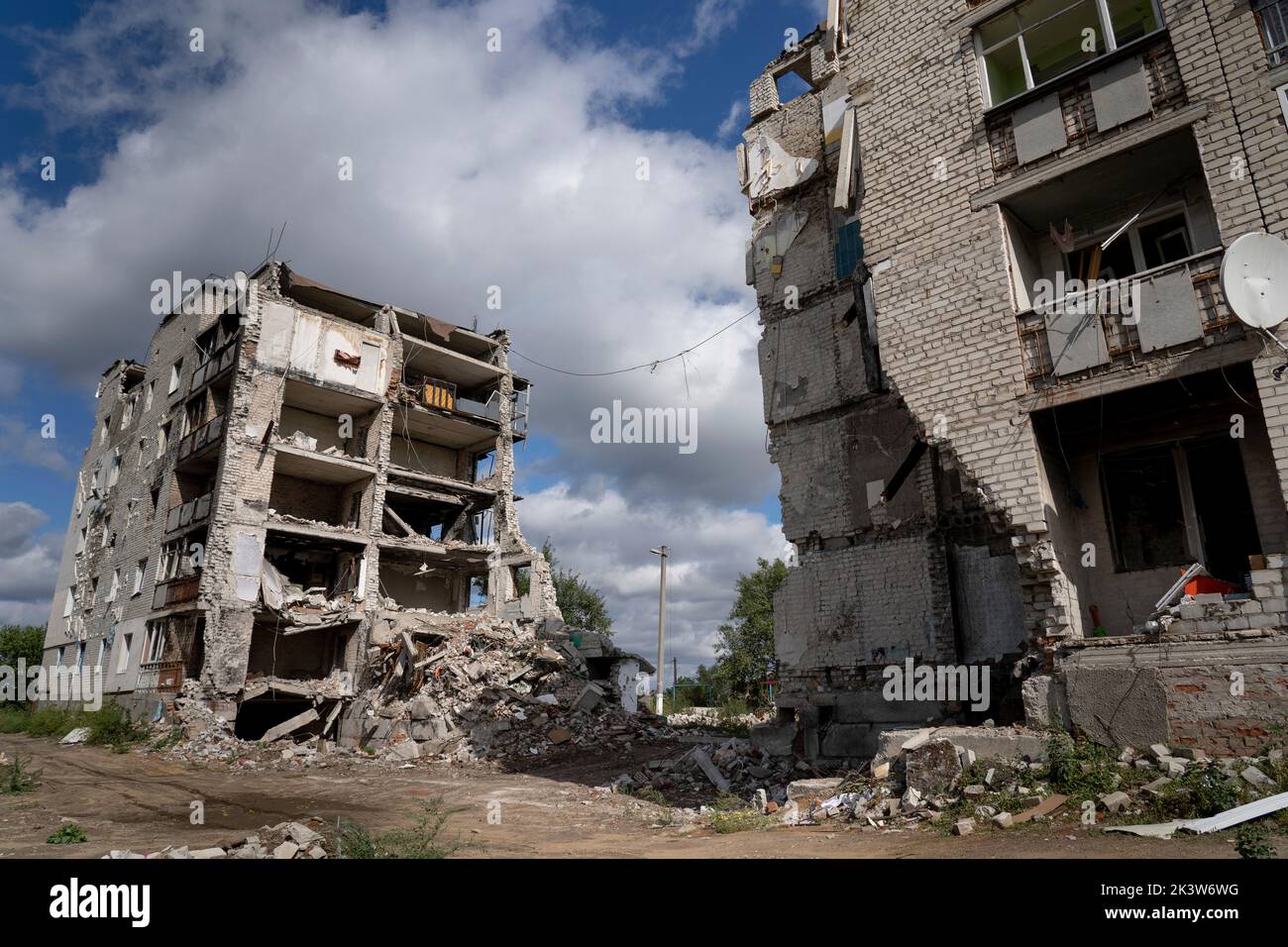 Izyum, Ukraine. 19th Sep, 2022. Two blocks of private residential buildings are seen severely destroyed due to a heavy shelling in early March. At least 47 people died. Ukrainian troops liberated Izyum and other key strategic areas in Kharkiv region three weeks ago. Residents slowly returning to normality despite signs of Russian occupants still in the city and the city remains out of water, electricity and gas. (Credit Image: © Ashley Chan/SOPA Images via ZUMA Press Wire) Stock Photo